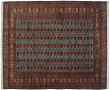 Detailed corner of a vintage Bokhara carpet with fine geometric borders and original side cord.