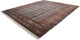 Full perspective of a vintage Bokhara carpet's orderly gul medallions and detailed borders.