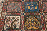 Close-up of the Four Season paneled motifs with tree of life and cypress trees.