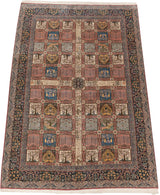 Angled view of a vintage Kerman design carpet showcasing its intricate Four Seasons paneled design.