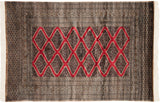 Fine vintage Pakistani Turkmen rug with cherry red stepped diamond medallions and intricate geometric borders.