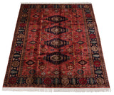 Lustrous vintage Pakistani Caucasian rug with Soumac-inspired geometric florals and navy medallions.