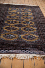 The plush, full pile and hand-knotted ivory fringe on a vintage Pakistani Turkmen rug.