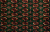 High sheen, plush wool pile of a vintage Bokhara rug with emerald green, rust, and navy gul medallions.