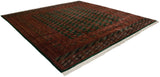 Hand-knotted vintage Bokhara square carpet showing a lustrous pile from an angled perspective.