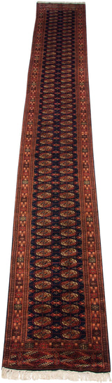 Vintage Bokhara runner, geometric gul medallions and borders on a rich navy field.