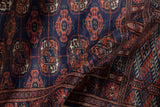 High sheen and luster on the plush, hand-knotted wool of a vintage Bokhara runner.