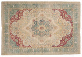 Vintage distressed Kerman design carpet with a starburst medallion in raspberry, seafoam, and ivory.