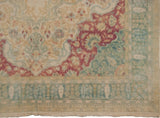 Close-up on the corner spandrel and Cyprus tree border in dusty raspberry and seafoam green.