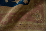 Vintage Serapi rug detail: dusty rose field, beige stepped outer medallion, Samovar border.