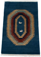 Polychrome concentric medallions with white ducks in a deep blue Qashqai design.