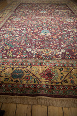 Full, secure beige fringe and detailed scrolling vine border on a vintage Bijar rug.
