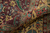Curled Vintage Indian Bijar rug displays plush pile, plum field, emerald green, and pale gold border.