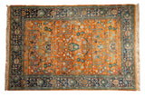 Vintage Indian Bijar carpet, orange rust field, gul ferang scrolling floral, navy and green border.