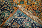Hand-knotted construction detail of vintage Indian Bijar rug, showing intact side cord and vibrant gul ferang motifs.