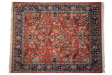 Vintage Indian Bijar design carpet features rust madder field, scrolling gul ferang florals, navy border, 7' x 8'11