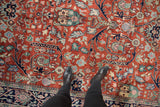 Vintage Indian Bijar rug's rust field with scrolling gul ferang floral motifs and blue border.