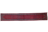Vintage Tajabad rug runner with an intricate allover boteh pattern in brick red, sapphire blue, and ivory.