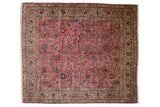 Vintage Tabriz square carpet with a detailed allover floral pattern on a pink field and a wide silver border.