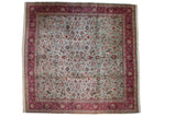 Vintage Tabriz square carpet with an allover forest theme on a dusty blue field and a deep red border.