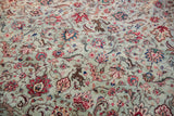 Intricate pictorial forest theme with deer and leopards on a hand-knotted vintage Tabriz carpet.