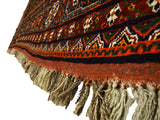 Original thick wool fringe and secured end finish of an antique hand-knotted Persian Afshar carpet.
