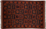 Vintage Taghan rug with a paneled design of geometric motifs in alternating chestnut and navy.