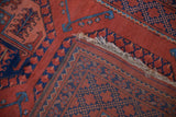 A folded corner on a vintage Ersari rug reveals its hand-knotted back and original selvage.