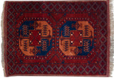 Full, even pile and pristine condition of a vintage hand-knotted Pakistani Ersari design rug.