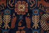 Navy blue Taghan field with copper floral, sapphire, saffron finned plants, and animal motifs.