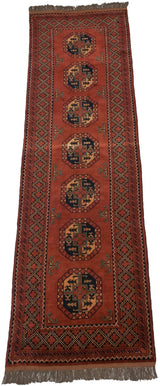 Chestnut Vintage Pakistani Ersari runner, repeating guls with navy, apricot details.