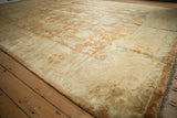 Soft plush wool pile with a silk-like luster on a vintage Oushak design carpet.