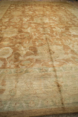 Low perspective across the lustrous and plush wool pile of the Oushak design carpet.