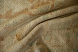The soft, plush wool pile of a vintage Oushak carpet with a silk-like feel and high luster.