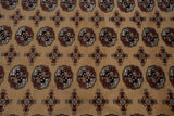 Close-up of the like-new, full pile of a vintage Bokhara, detailing its geometric guls in red and ivory.