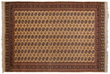 Even, full pile showing the detailed geometric guls on a vintage golden Bokhara carpet.
