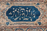 Signature border cartouche with Persian literature on an antique hand-knotted Kermanshah carpet.