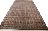 Full length angled view of a vintage Bulgarian Tabriz carpet with compartmentalized garden motifs.