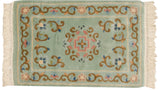 Peking inspired Japanese Arts and Crafts rug mat, mint green, scrolling vinery, geometric medallion.