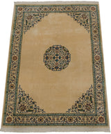 Japanese Arts and Crafts carpet with roundel medallion and intricate scrolling vine borders.