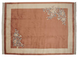 Chinese Art Deco carpet, apricot field, ivory border, and soft floral sprays.