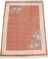 Soft, even apricot pile of the Art Deco carpet's open field.