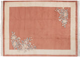 Detailed floral spray in ivory, powder blue, and mauve on a vintage Art Deco carpet.