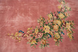 Vintage Japanese Art Deco carpet with pink field, vibrant floral vines, and embossed carving.