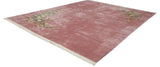 Lustrous rose Art Deco rug features ornate end foliage and subtle shadow embossed field carving.