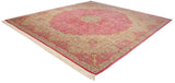 Vintage Kerman design square carpet from an angle, showing its pink floral field and ivory border.
