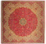 Vintage square Kerman carpet with a starburst medallion on a pink and ivory millefleur field.