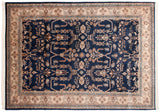 Vintage Indian Sarouk carpet with sprawling floral branches on a navy blue field and an ivory border.