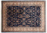 Detailed view of the sprawling hand-knotted Mohajeran Sarouk design on a plush navy blue wool pile.