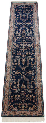 Navy blue Mohajeran Sarouk runner with elongated branches, intricate beige border, and fringe.